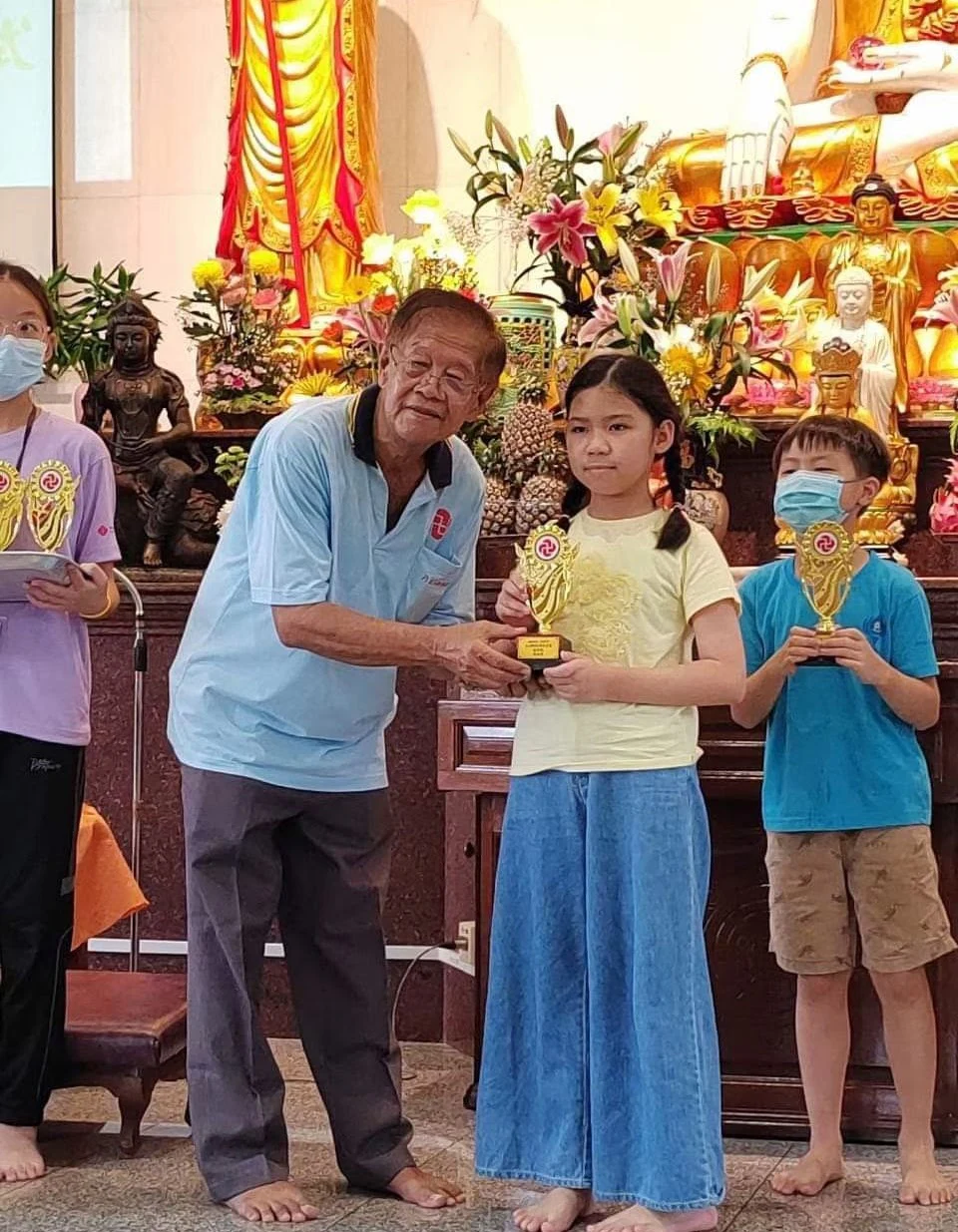 Student receiving recognition at a prize presentation