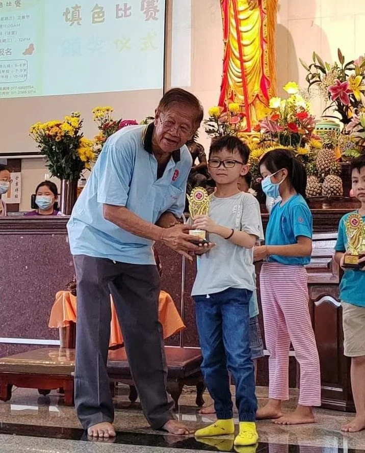 Student receiving a prize during an award ceremony