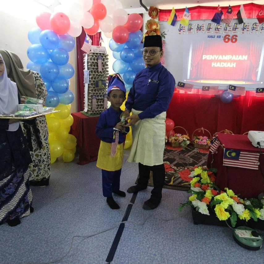 Student receiving recognition on an event stage